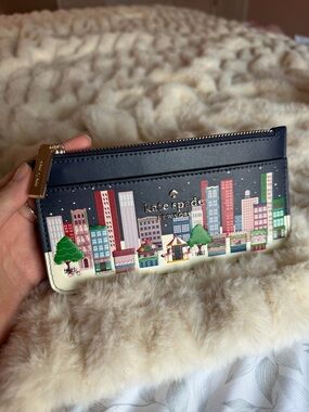 NWOT Kate Spade New York zip wallet with colorful cityscape print
